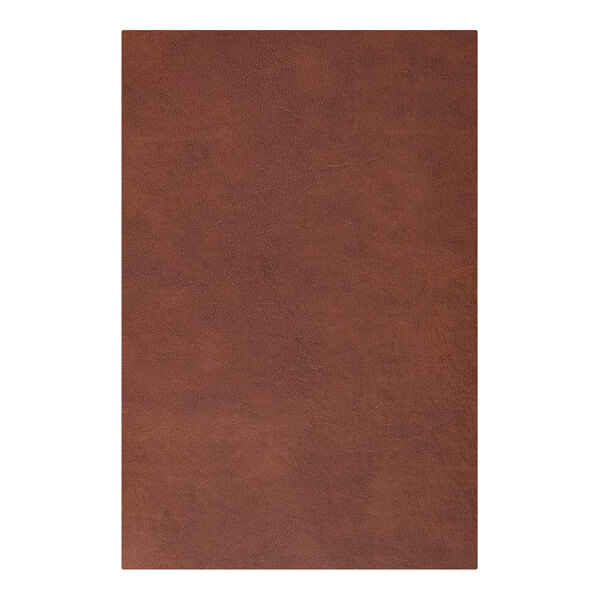 A close-up of a brown leather H. Risch, Inc. menu cover.