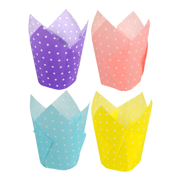 A group of Hoffmaster tulip baking cups with white wrappers and colorful polka dots including blue, pink, purple, and yellow.