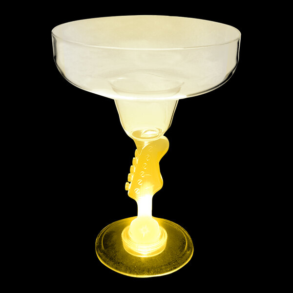 A 12 oz. plastic margarita glass with a yellow guitar stem and a yellow LED light inside.