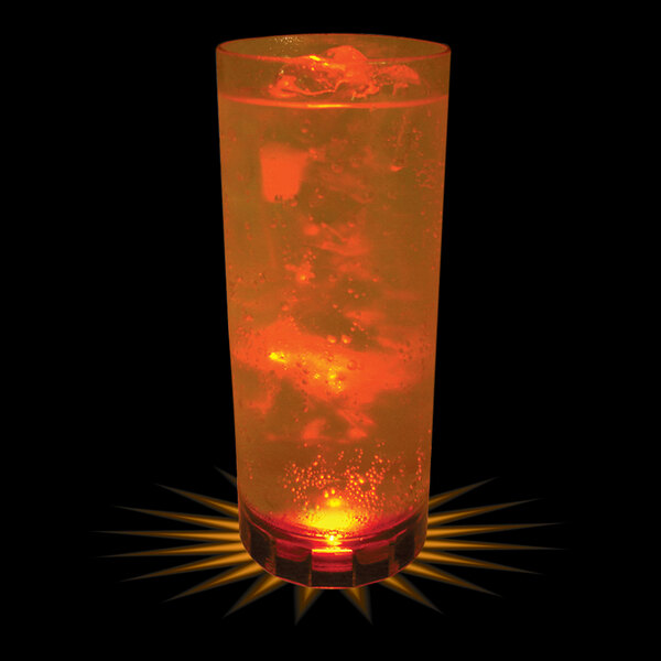A 14 oz. plastic cup with a red LED light inside filled with a red drink and ice.