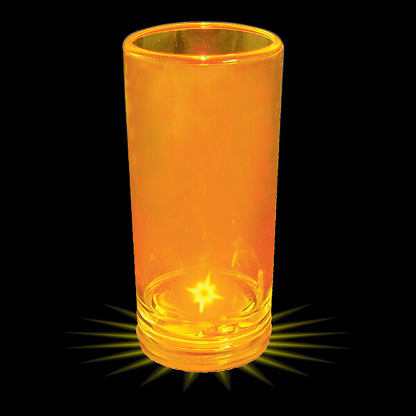 A customizable plastic champagne shooter with a yellow LED light inside.