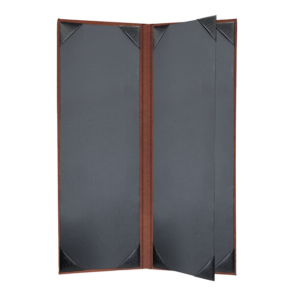 A black rectangular menu cover with brown corners on a wood cabinet.