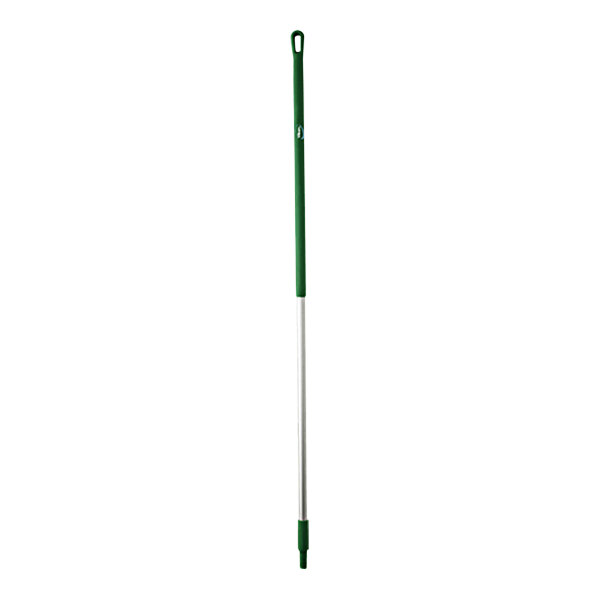 A green and silver Vikan aluminum handle with a white tip.