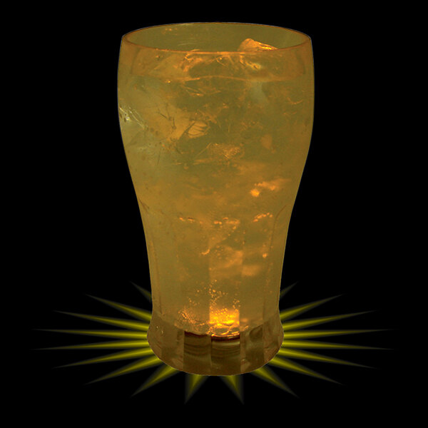 A 12 oz. plastic soda cup with a yellow LED light inside filled with a drink.