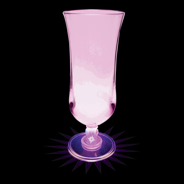A customizable plastic hurricane cup with a purple LED light filled with a pink drink.