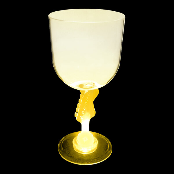 A close-up of a 14 oz. plastic guitar stem goblet with a yellow LED light inside.