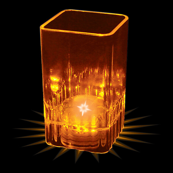 A customizable plastic square shot cup with an orange LED light inside.