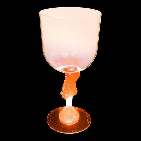 A clear plastic guitar stem goblet with an orange LED light on the rim.