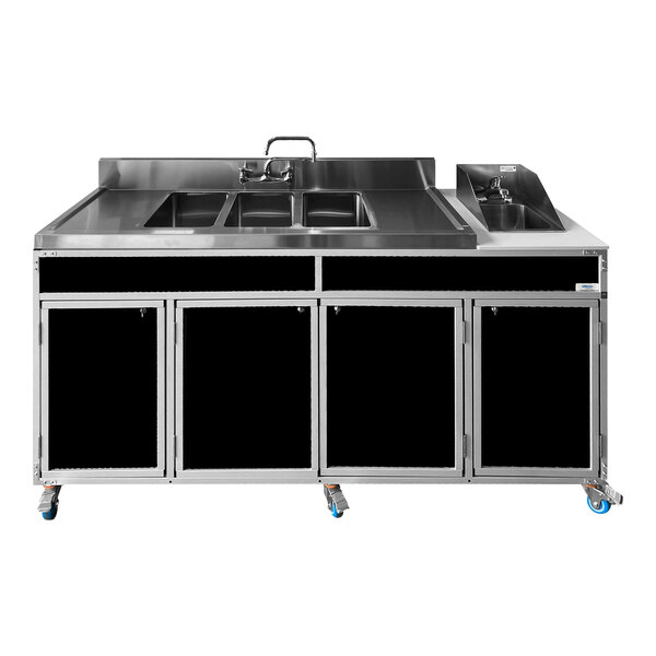 A black Monsam portable self-contained sink with four basins and two drainboards.