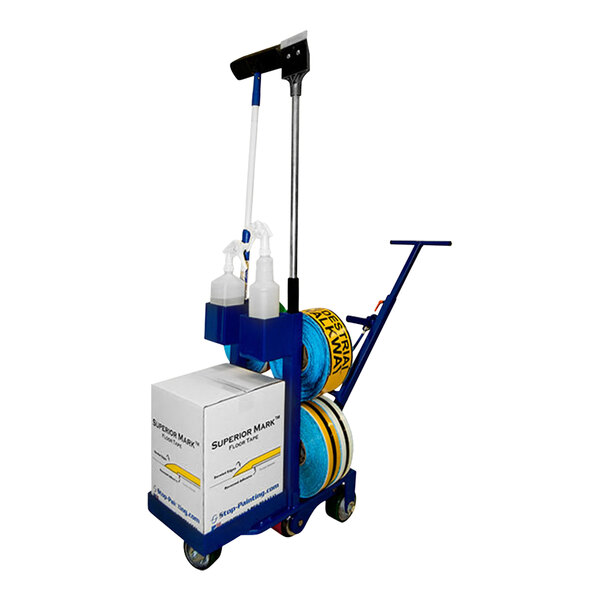 A blue Superior Mark floor tape applicator cart with white and blue boxes on it.