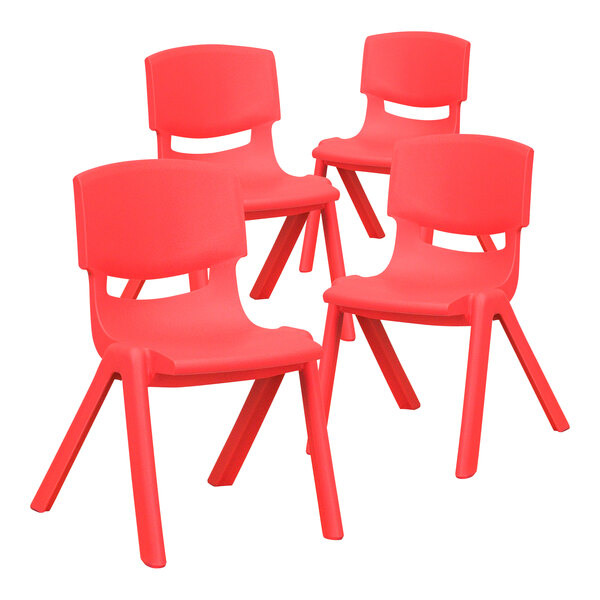 A set of four red plastic Flash Furniture Whitney stackable chairs.
