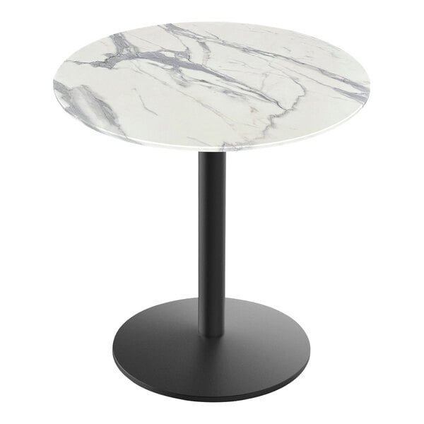 A white marble round table with a black base.