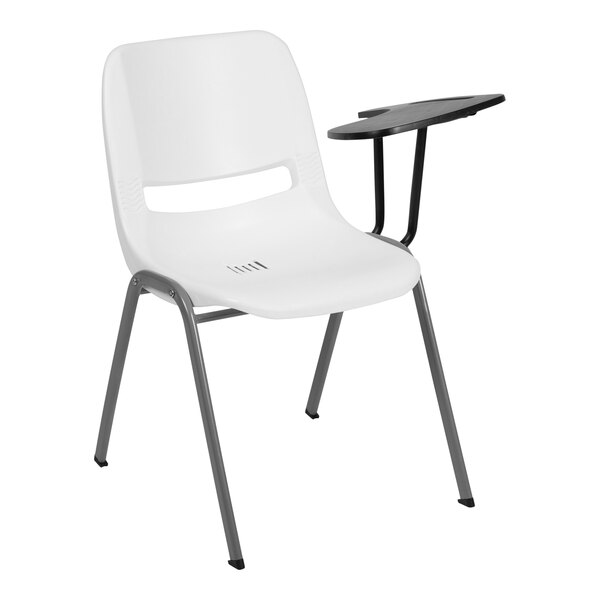 A white Flash Furniture shell chair with a black flip-up tablet arm.