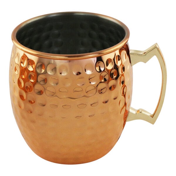 A Franmara hammered copper Moscow Mule mug with a handle.