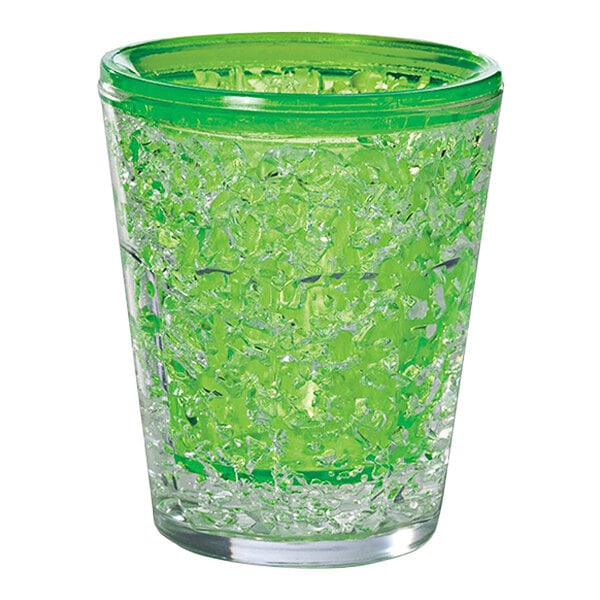 A Franmara clear shot glass with green freezer gel inside.