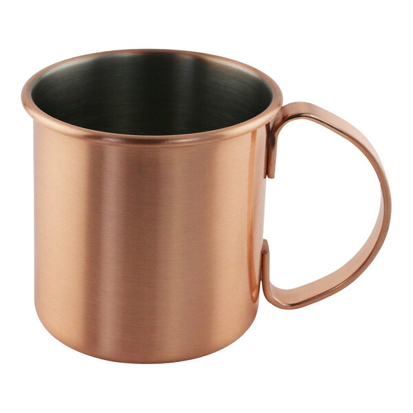 A copper Moscow Mule mug with a handle.