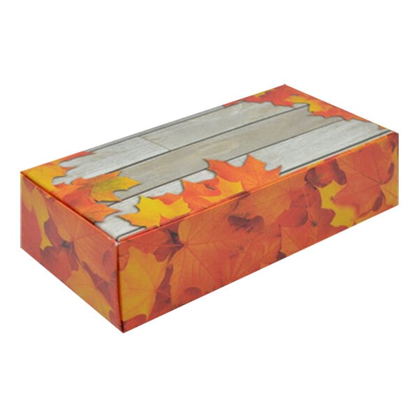 An Autumn candy box with a leaf pattern.