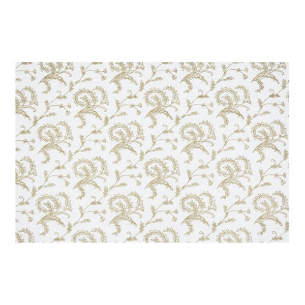 A white glassine candy box pad with gold floral pattern.