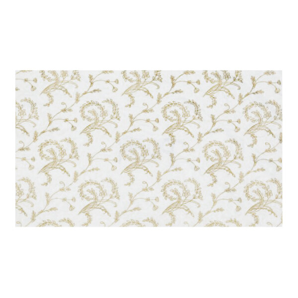 A white fabric pad with gold floral pattern.