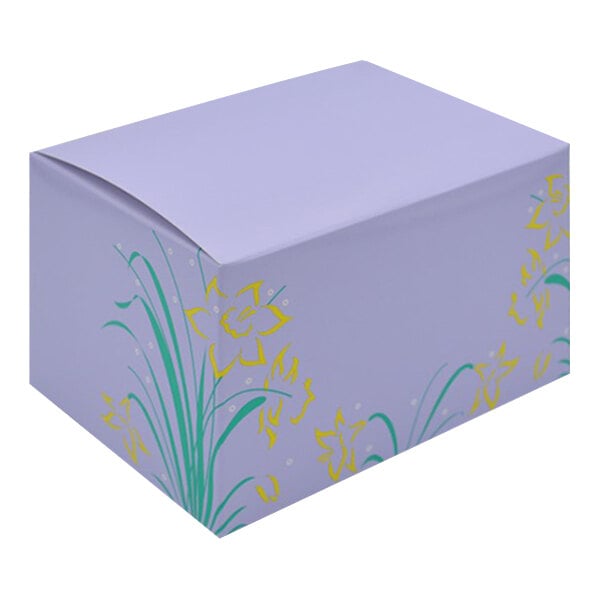 A white 1 lb. candy box with a purple Easter egg design and yellow flowers.