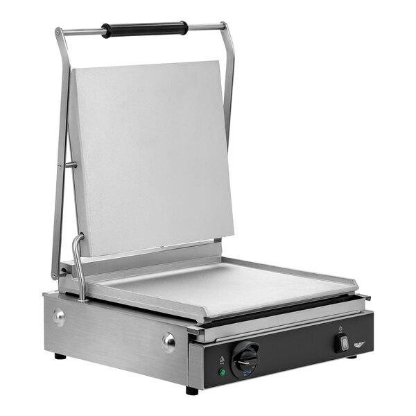 A Vollrath commercial panini grill with smooth metal plates.