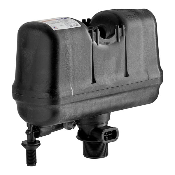 A black plastic Flushmate tank with two holes.