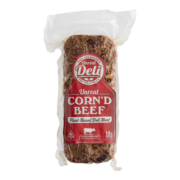 A package of Unreal Deli plant-based vegan corn'd beef slices on a table.