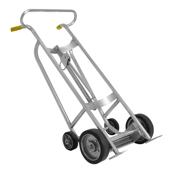 A silver Wesco Industrial Products aluminum hand truck with black rubber wheels and a brake.