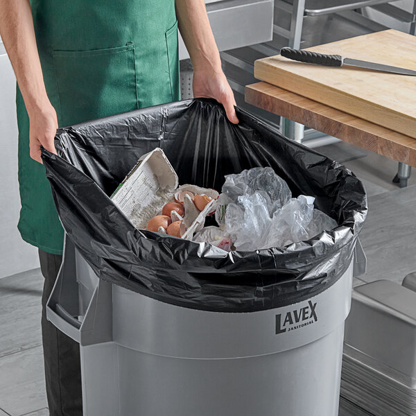 60 GALLONS BLACK LOW DENSITY TRASH BAGS , SOLD BY THE CASE