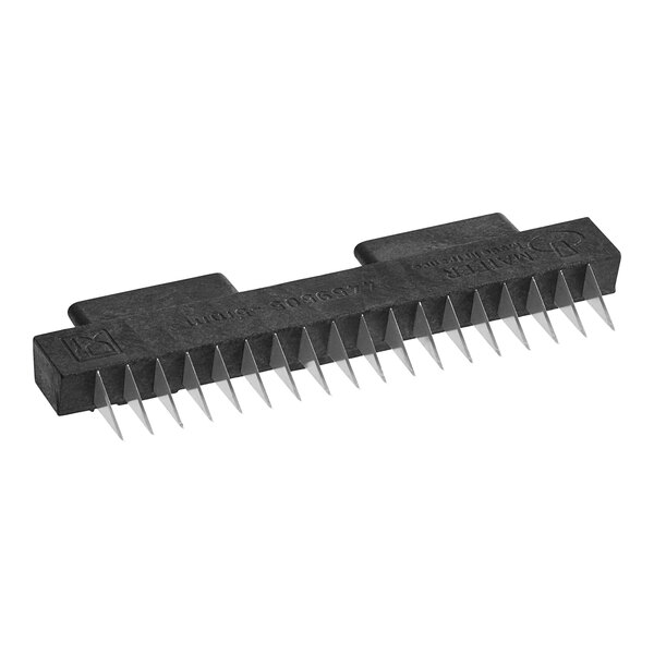 A black rectangular object with sharp spikes.
