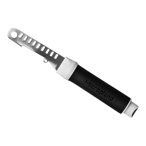 A black and white Microplane 7-in-1 Ultimate Bar Tool  with a cover.