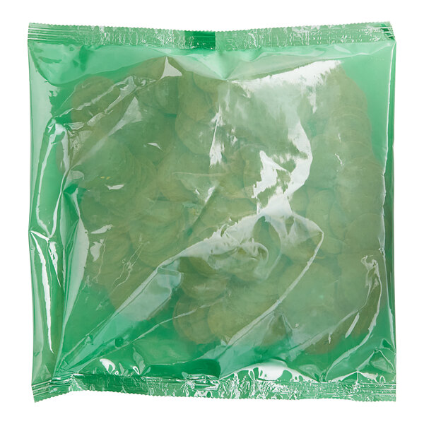 A green plastic bag of Beyond Meat Plant-Based Vegan Pepperoni.