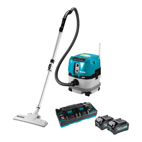 A Makita wet/dry vacuum with two black and blue batteries.