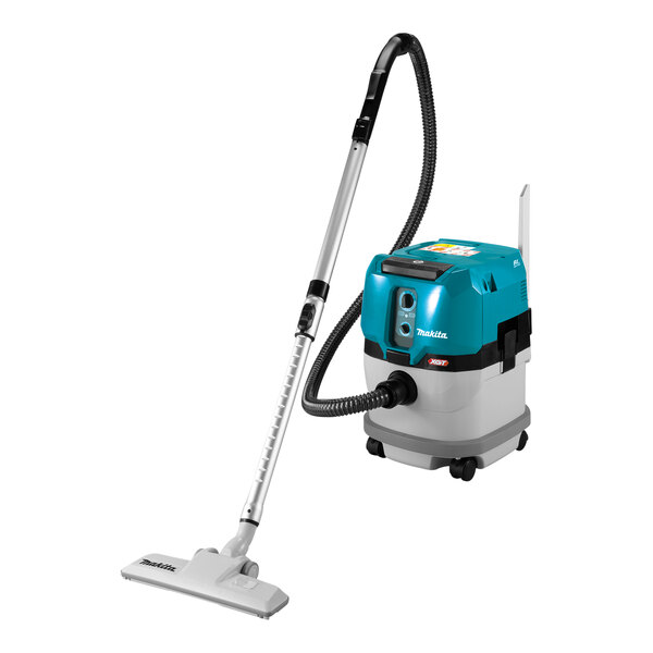A Makita wet/dry vacuum with a blue and white hose and handle.