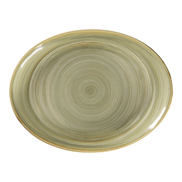 A close up of a RAK Porcelain emerald green oval platter with a circular pattern on the surface.