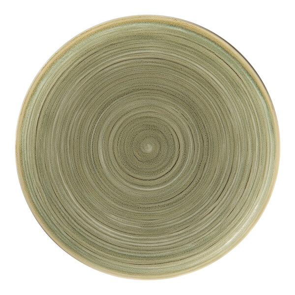 A close up of a RAK Porcelain emerald green flat coupe plate with a spiral design.
