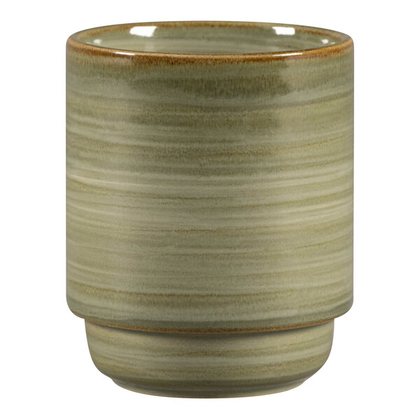 A green RAK Porcelain mug with a brown rim.