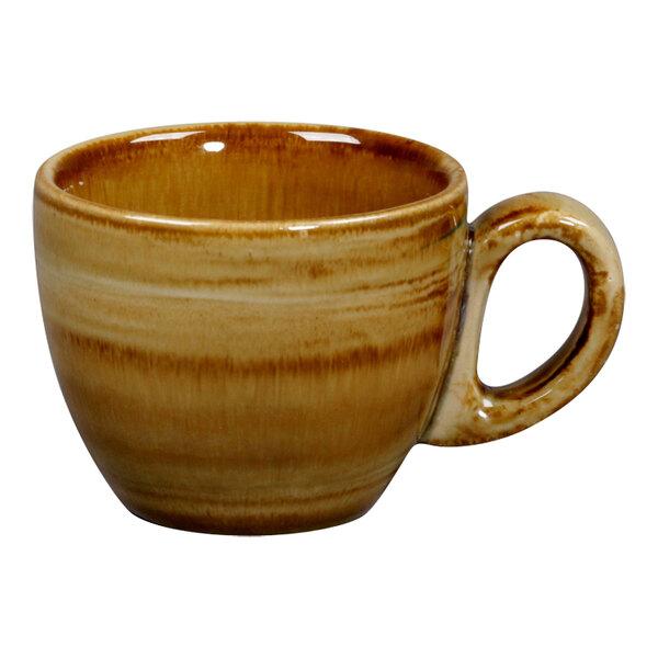 A brown and white RAK Porcelain espresso cup with a handle.