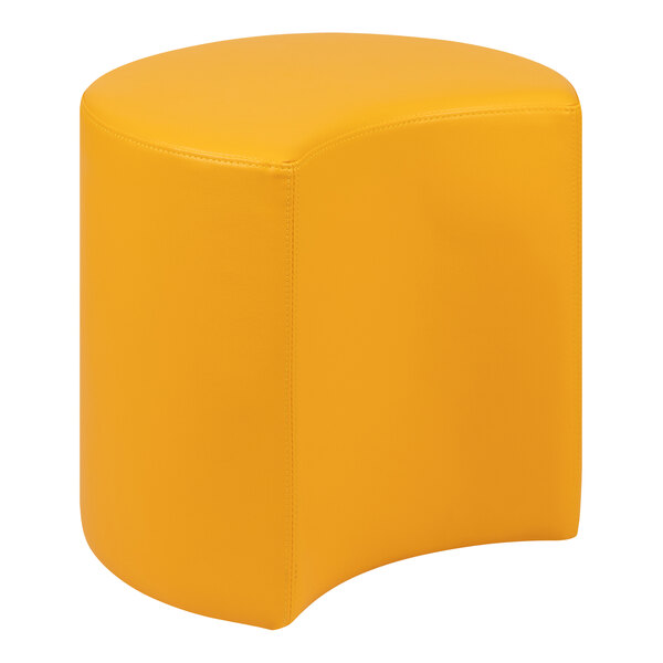 A yellow curved leather ottoman stool.