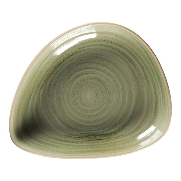 A close up of a RAK Porcelain emerald green organic deep plate with a spiral design.