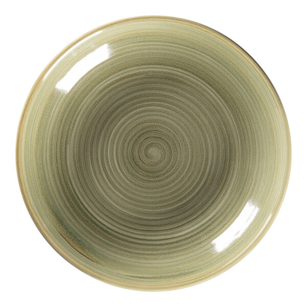 A close-up of a green RAK Porcelain deep coupe plate with a spiral design.