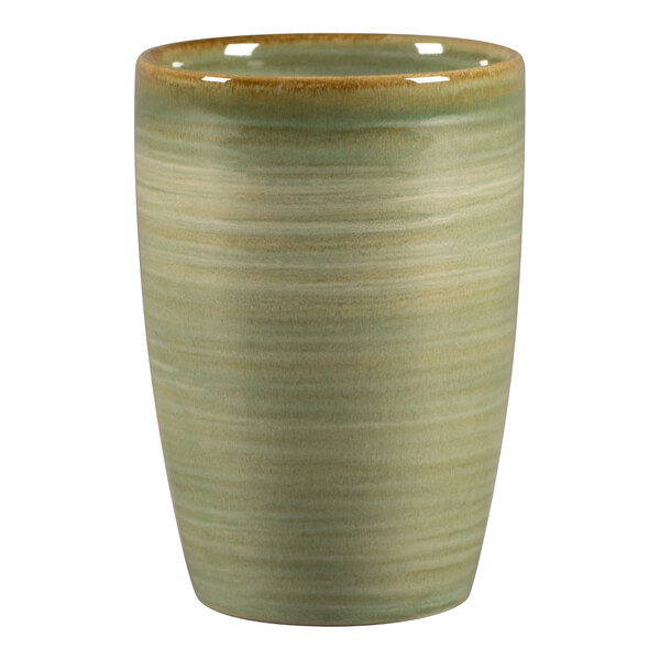 A close-up of a green RAK Porcelain mug with a brown rim.