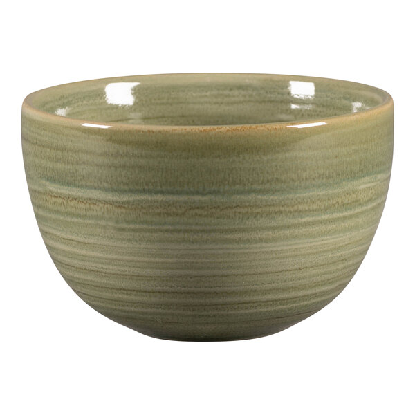 A green porcelain cup with a white stripe around the rim.