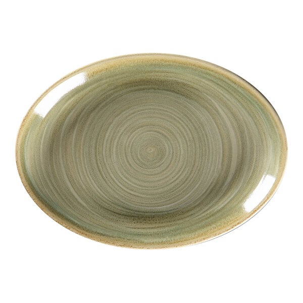An emerald green RAK Porcelain oval platter with a spiral design.