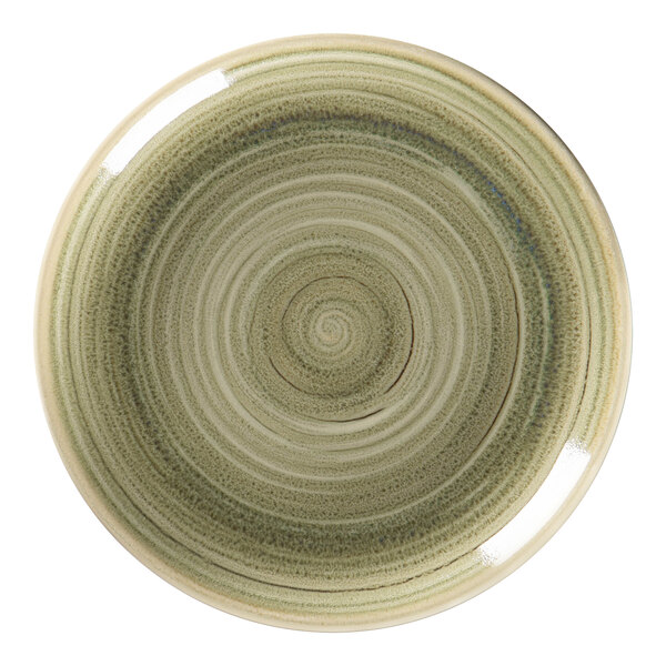 A close-up of a RAK Porcelain emerald green flat coupe plate with a spiral design.