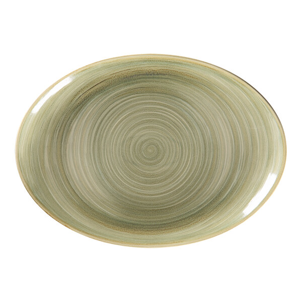 A green RAK Porcelain oval platter with a spiral design.