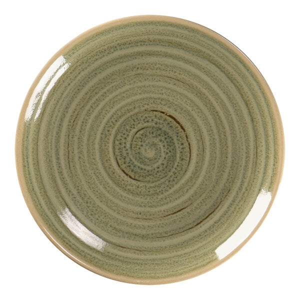 A close up of a RAK Porcelain emerald green plate with a spiral design.