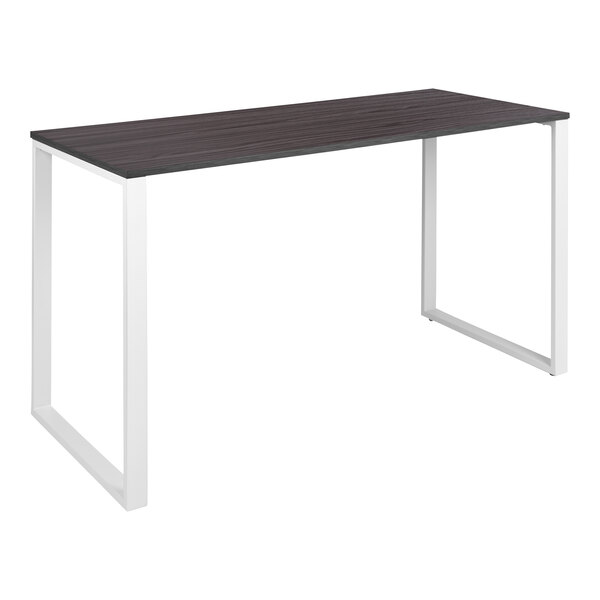 A rectangular black and white desk with a black top.