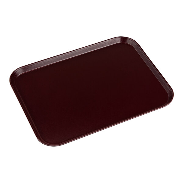 A rectangular dark cranberry Dinex fiberglass tray.