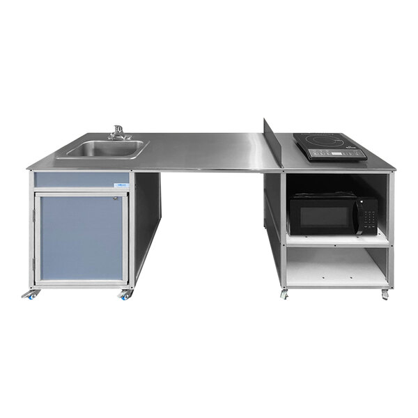 A gray Monsam wheelchair accessible kitchen table with a self-contained sink and microwave.
